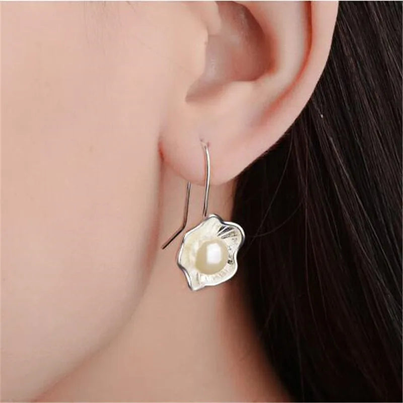 Tempérament nouvelle mode Style ethnique 925 en argent Sterling plaqué femme créative Lotus perle fleur fraîche balancent boucles d'oreilles SE307
