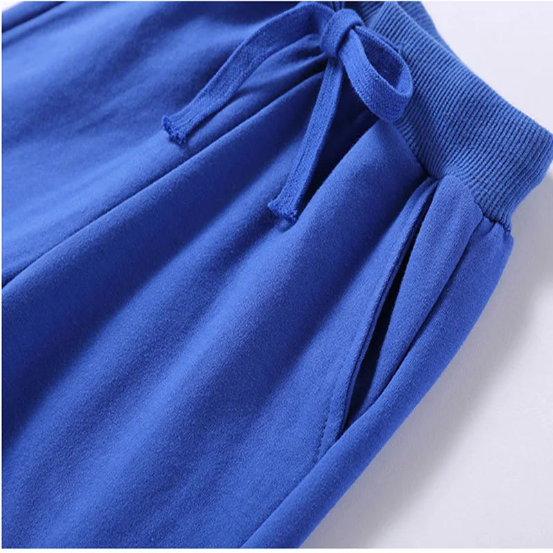 Nouvelle vente au détail pantalons en coton pour 2-10 ans solide garçons filles pantalons de Sport décontractés Jogging Enfant Garcon enfants pantalons pour enfants