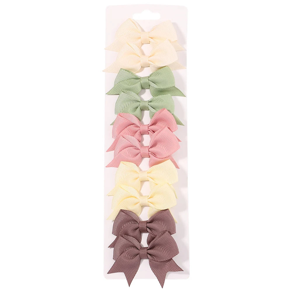 Pinces à cheveux avec nœuds pour enfants, couleur unie, pour bébés filles, ruban fait à la main, épingle à cheveux, Barrettes, accessoires pour cheveux du nouvel an, 10 pièces/ensemble