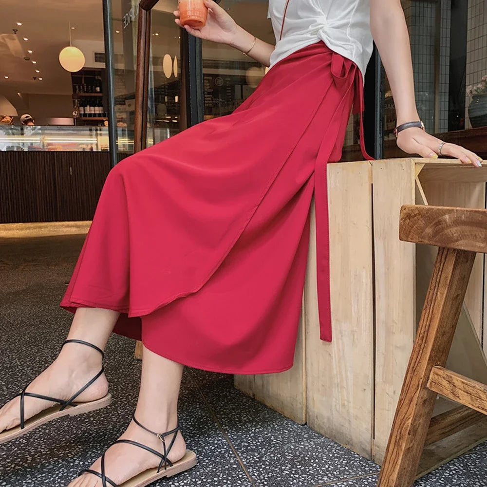 Printemps été automne plage jupe femmes 9 couleurs taille haute côté cravate décontracté jupe portefeuille femme solide élégant Midi jupe vêtements