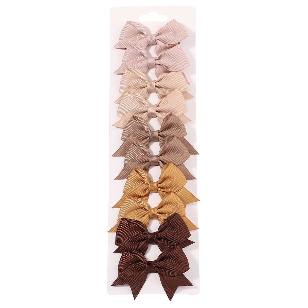 Pinces à cheveux avec nœuds pour enfants, couleur unie, pour bébés filles, ruban fait à la main, épingle à cheveux, Barrettes, accessoires pour cheveux du nouvel an, 10 pièces/ensemble