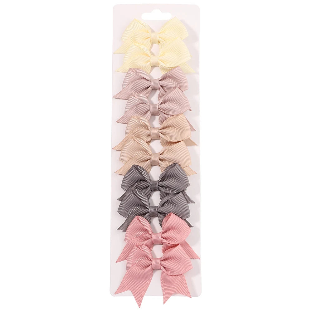 Pinces à cheveux avec nœuds pour enfants, couleur unie, pour bébés filles, ruban fait à la main, épingle à cheveux, Barrettes, accessoires pour cheveux du nouvel an, 10 pièces/ensemble