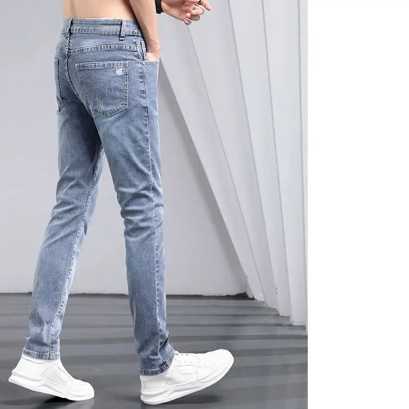 2025 été jean de couleur claire hommes à la mode marque jeunesse Slim-fit élastique Pantalon coréen pantalons longs Streetwear hommes Pantalon Homme