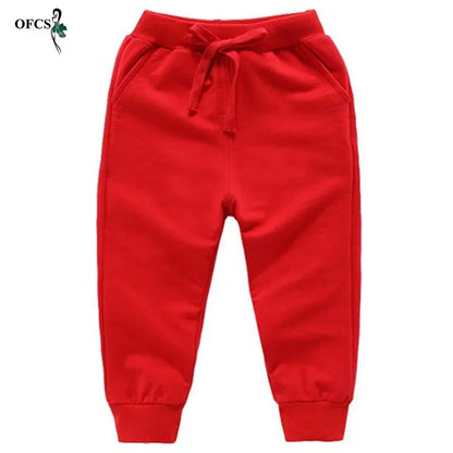 Nouvelle vente au détail pantalons en coton pour 2-10 ans solide garçons filles pantalons de Sport décontractés Jogging Enfant Garcon enfants pantalons pour enfants