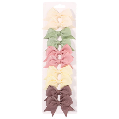 Pinces à cheveux avec nœuds pour enfants, couleur unie, pour bébés filles, ruban fait à la main, épingle à cheveux, Barrettes, accessoires pour cheveux du nouvel an, 10 pièces/ensemble