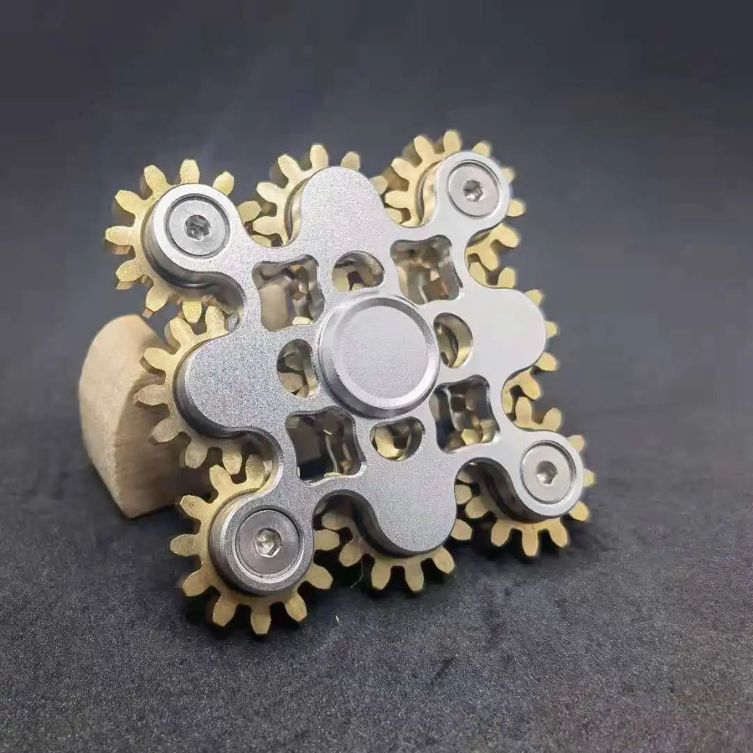 Nouveau design engrenage doigt gyroscope rotor tout en cuivre Fidget neuf dents liaison EDC alliage métallique rotor focalisation décompression jouet