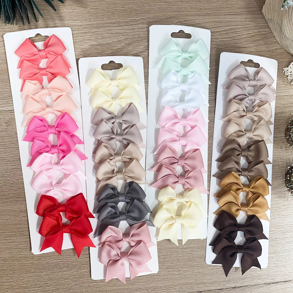 Pinces à cheveux avec nœuds pour enfants, couleur unie, pour bébés filles, ruban fait à la main, épingle à cheveux, Barrettes, accessoires pour cheveux du nouvel an, 10 pièces/ensemble