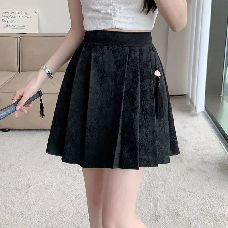 2025 été femme grande taille taille élastique jupes femmes taille haute plissée robe courte dame Chic concepteur solide imprimé jupes