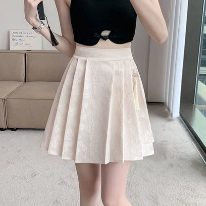 2025 été femme grande taille taille élastique jupes femmes taille haute plissée robe courte dame Chic concepteur solide imprimé jupes