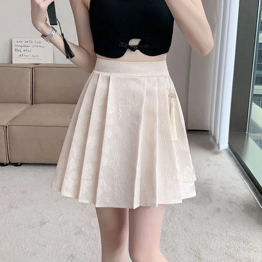 2025 été femme grande taille taille élastique jupes femmes taille haute plissée robe courte dame Chic concepteur solide imprimé jupes