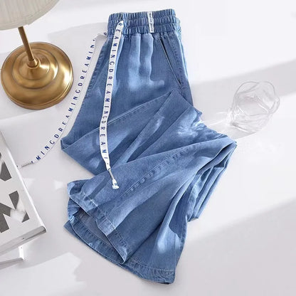Jean élastique taille haute et jambes larges. Nouveau jean Tencel fin décontracté à lacets en soie glacée à la mode pour les femmes au printemps et en été