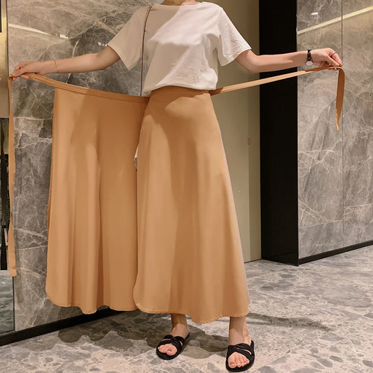 Printemps été automne plage jupe femmes 9 couleurs taille haute côté cravate décontracté jupe portefeuille femme solide élégant Midi jupe vêtements