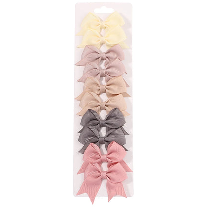 Pinces à cheveux avec nœuds pour enfants, couleur unie, pour bébés filles, ruban fait à la main, épingle à cheveux, Barrettes, accessoires pour cheveux du nouvel an, 10 pièces/ensemble
