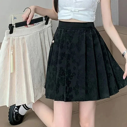 2025 été femme grande taille taille élastique jupes femmes taille haute plissée robe courte dame Chic concepteur solide imprimé jupes