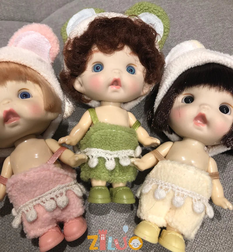 BJD poupées pour filles 10cm OB11 Mini poupée 3D yeux bleus verts Kawaii jouets de poche mignon Surprise visage vêtements filles jouet cadeau d'anniversaire