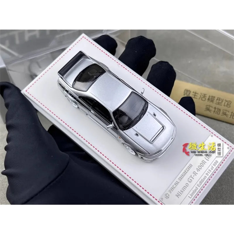 Stock 1:64 GTR R33 400R Skyline R32 R35 modèle de voiture moulée sous pression en alliage, jouet pour adolescents, à collectionner, cadeau d'anniversaire pour enfants.