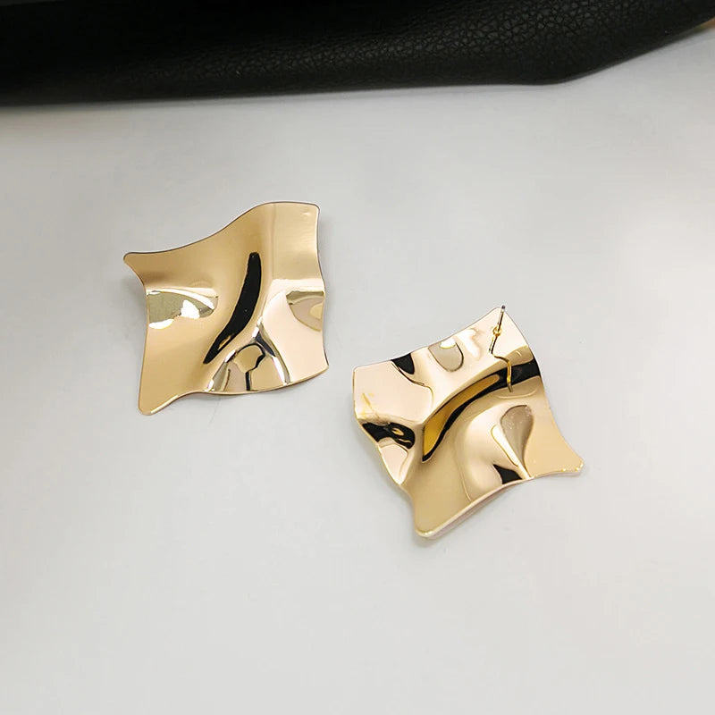 Boucles d'oreilles pendantes en métal pour femmes, boucles d'oreilles Pmot irrégulières, boucles d'oreilles géométriques torsadées,