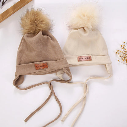 Couleur unie pompon infantile fille garçon chapeau Imitation cachemire bébé oreille Protection casquette automne hiver chaud enfant en bas âge enfants laçage Beanie