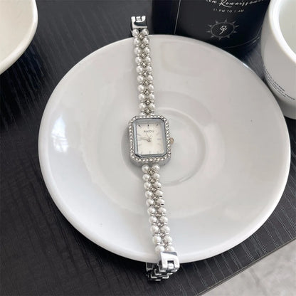 Perle de luxe cloutée Bracelet femmes montre dames cadeau Bracelet montres mode Quartz