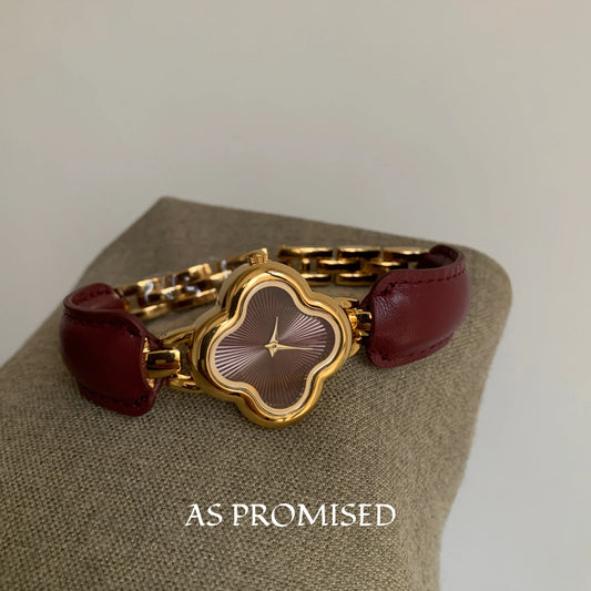 Montre à cadran fleuri pour femme, bracelet de luxe léger à la mode,